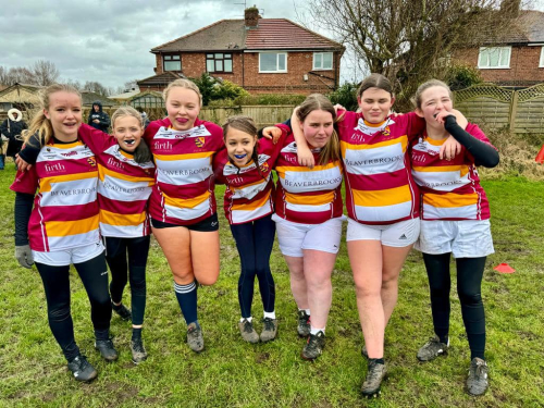 A group photo of girls playing for Fylde Community Foundation